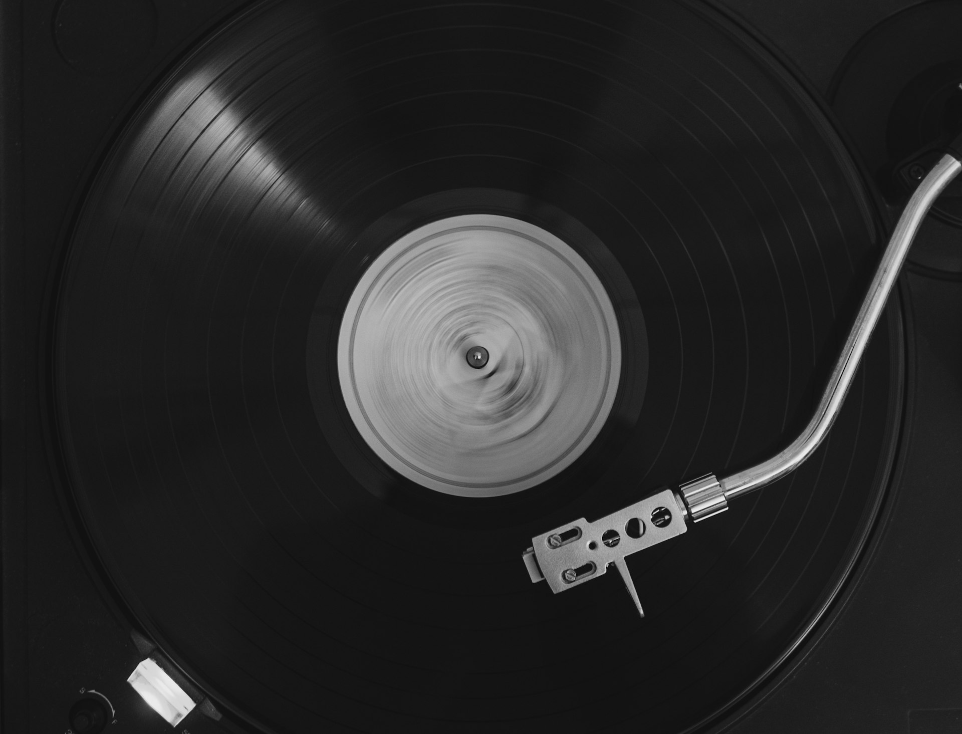 Warm vintage recording studio with vinyl records and analog equipment